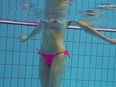Hot Redhead Pale Skin Teen Babe In Pink Bikini Dives In The Pool